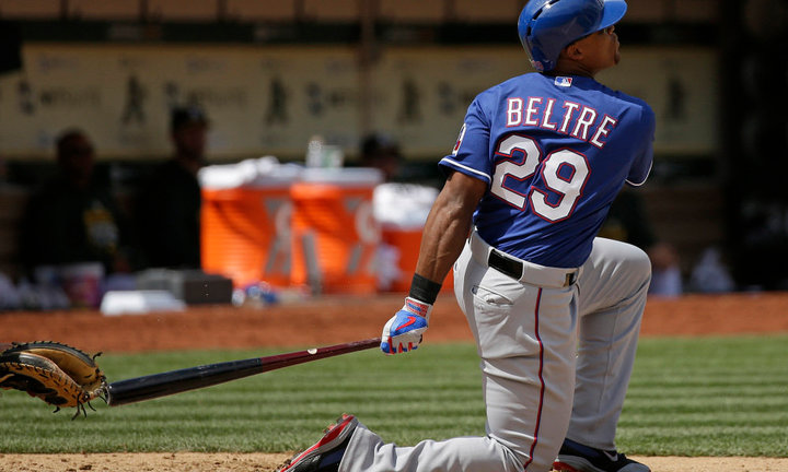 Texas Rangers' Adrian Beltre hits a home run off Oakland Athletics relief pitcher Evan Scribner in the seventh inning of their baseball game Thursday, April 9, 2015, in Oakland, Calif. (AP Photo/Eric Risberg) ORG XMIT: OAS108